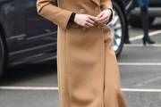 Kate Middleton prošetala u klasičnom kaputu s potpisom high street brenda kojeg vole i domaće fashionistice