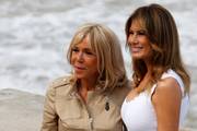 Prve dame Melania Trump i Brigitte Macron zablistale u ultravisokim potpeticama i chic haljinama